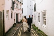 couple crossing road