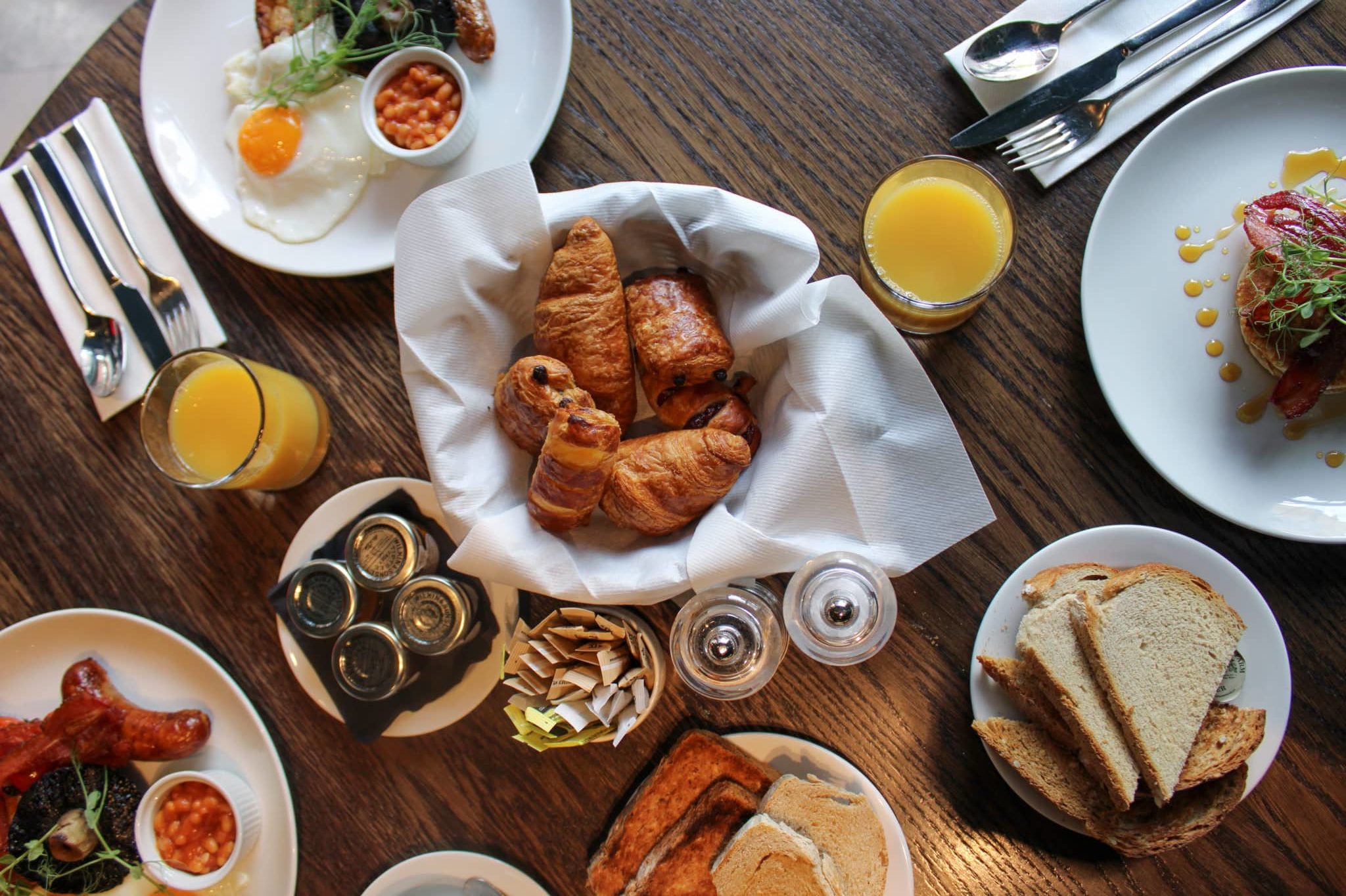 Table set with a variety of breakfast dishes