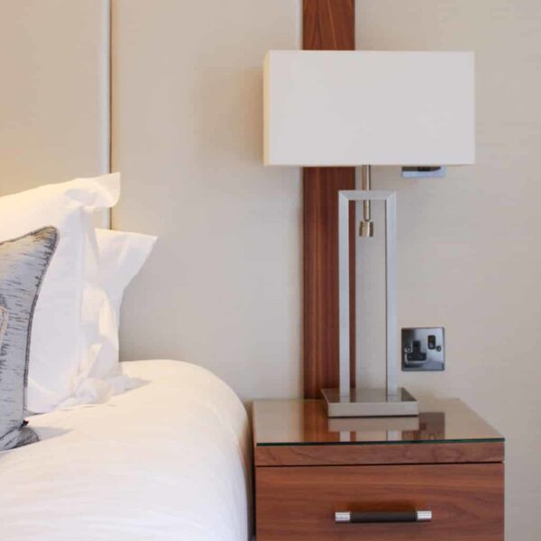 Bed side table with a lamp