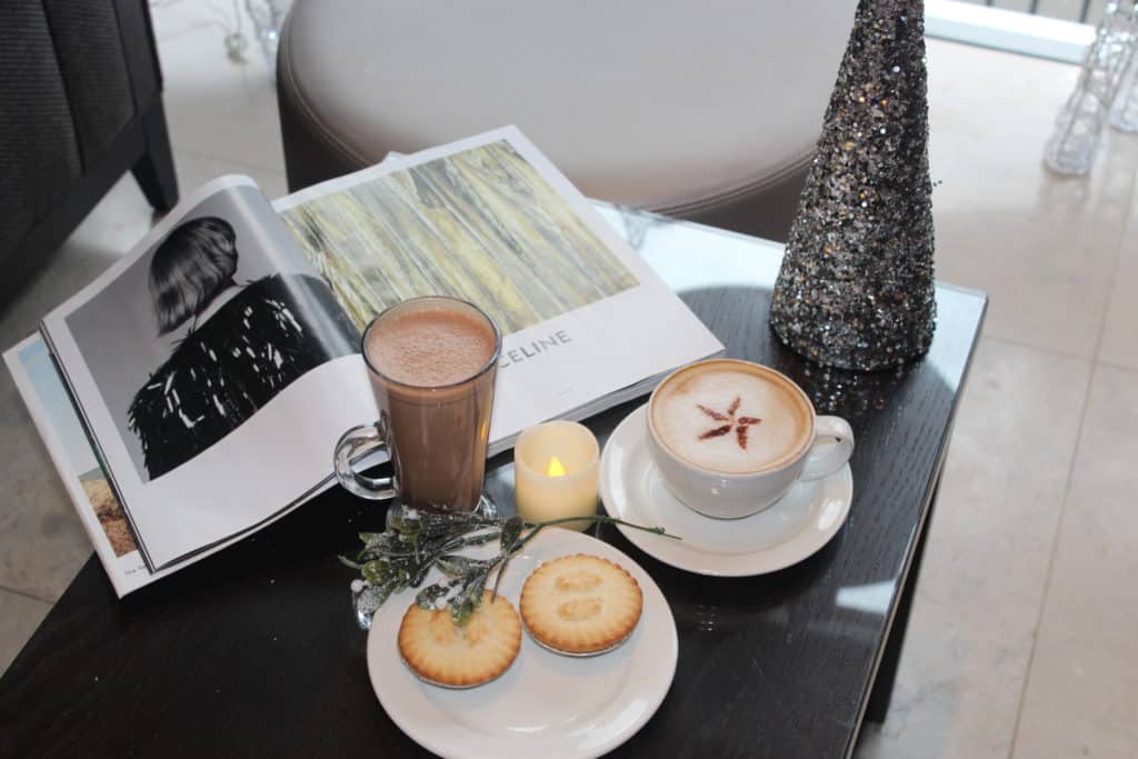 coffees and mince pies with a festive background