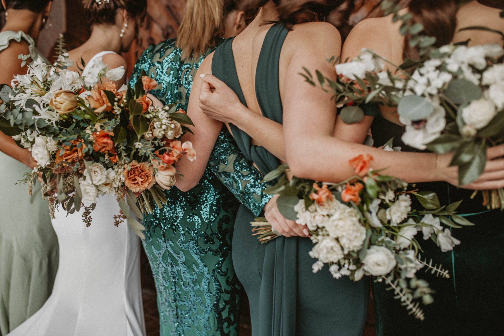 winter wedding dresses with winter bouquets of flowers