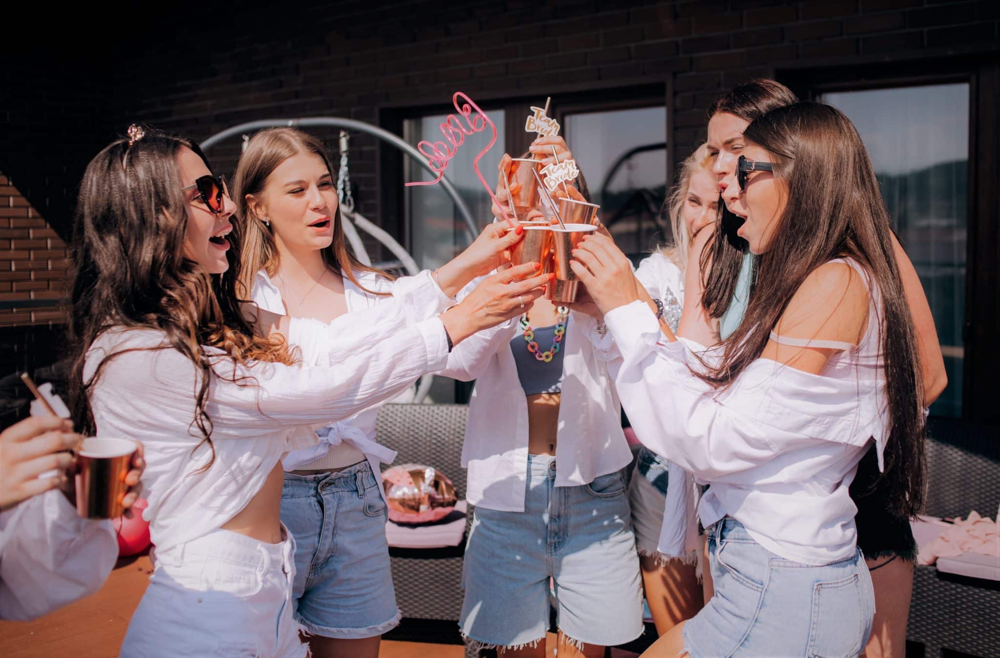 6 women making a toast at a hen party