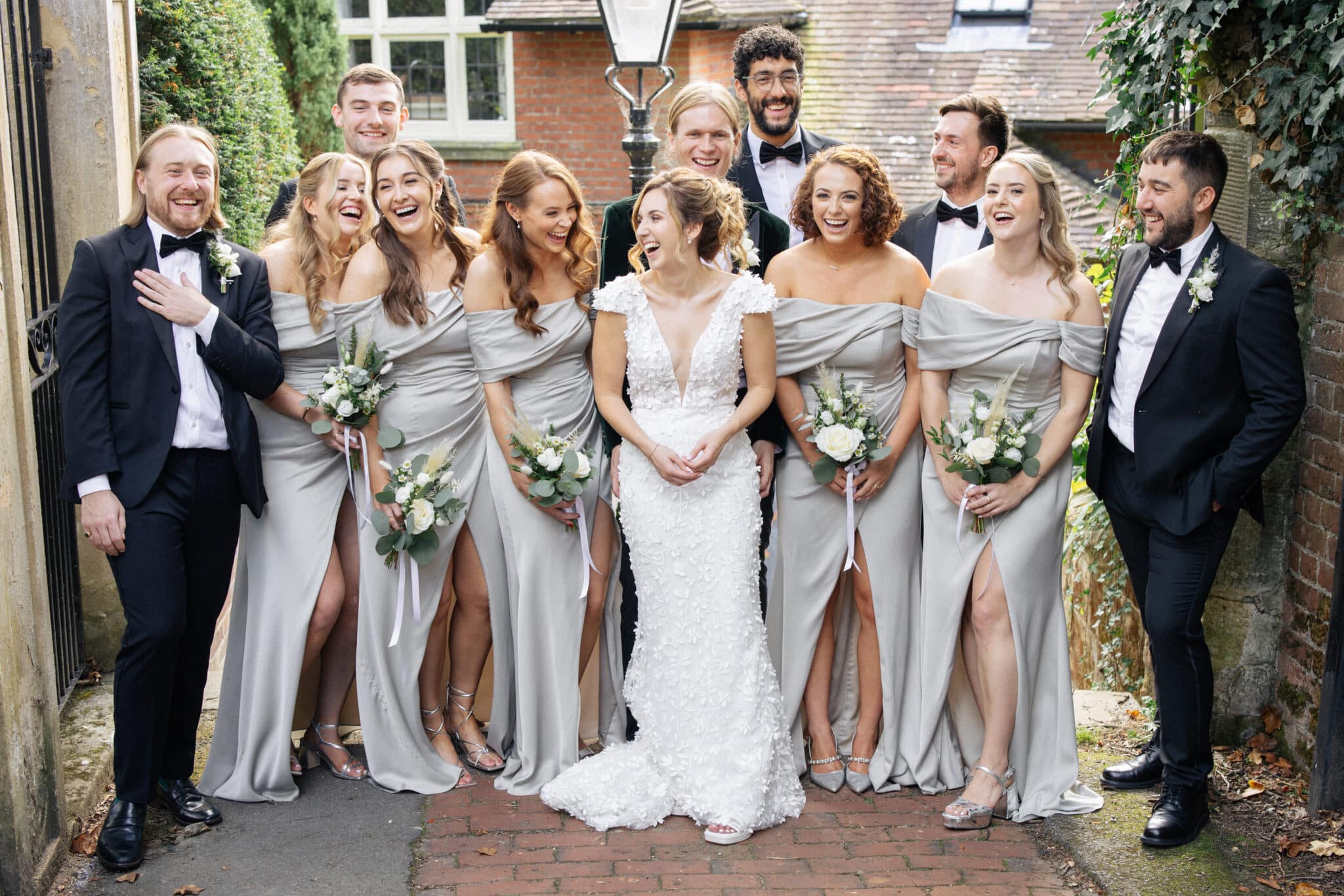 Bride, Groom, Bridesmaids and Groomsmen celebrating a wedding at One Warwick Park