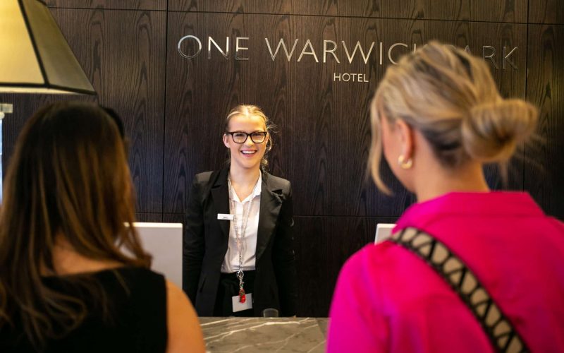 Two business women checking in at a luxury hotel in Tunbridge Wells