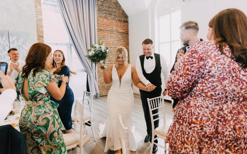 Bride and Groom entering the function room at One Warwick Park