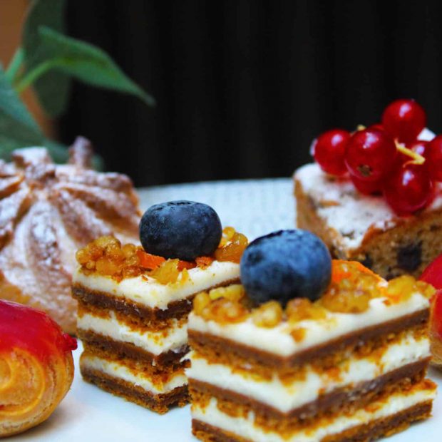 Close-up of artisan cakes and pastries from a luxury afternoon tea in Tunbridge Wells.